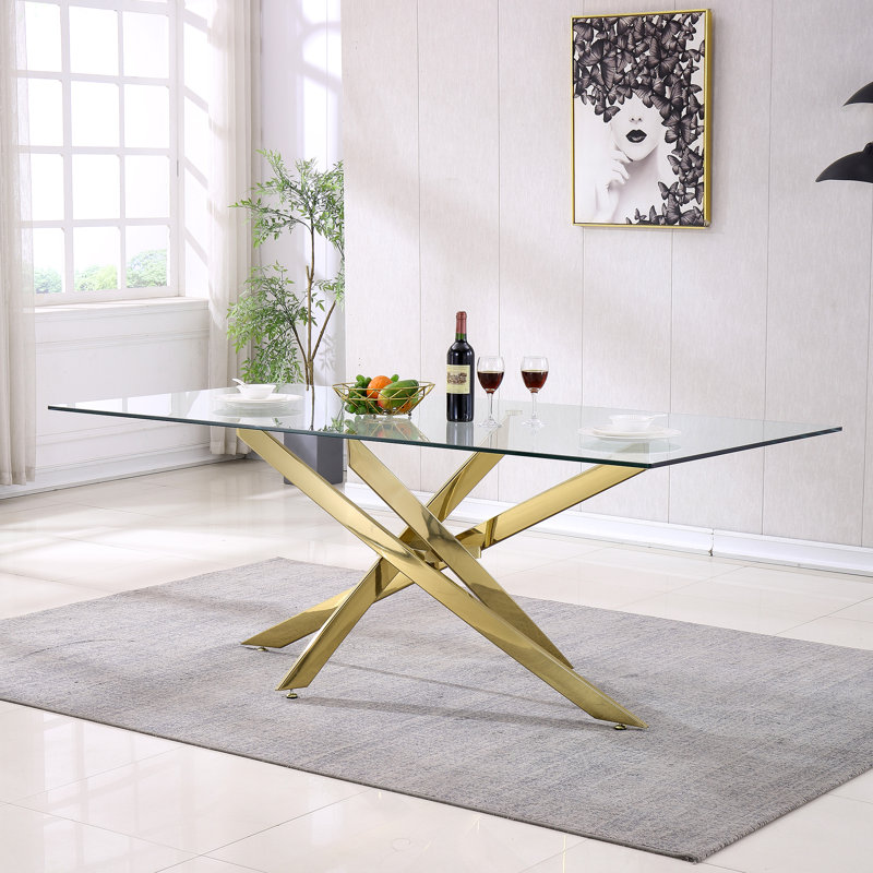 Glass top dining table with gold base hotsell